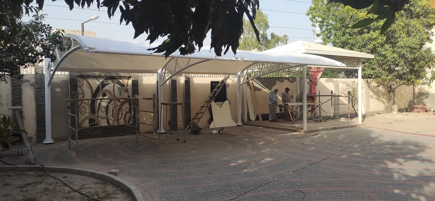 Car Parking shade for home (1) Stylish and durable designed Tensile car parking shade for home use, offering weather protection and modern aesthetics.
