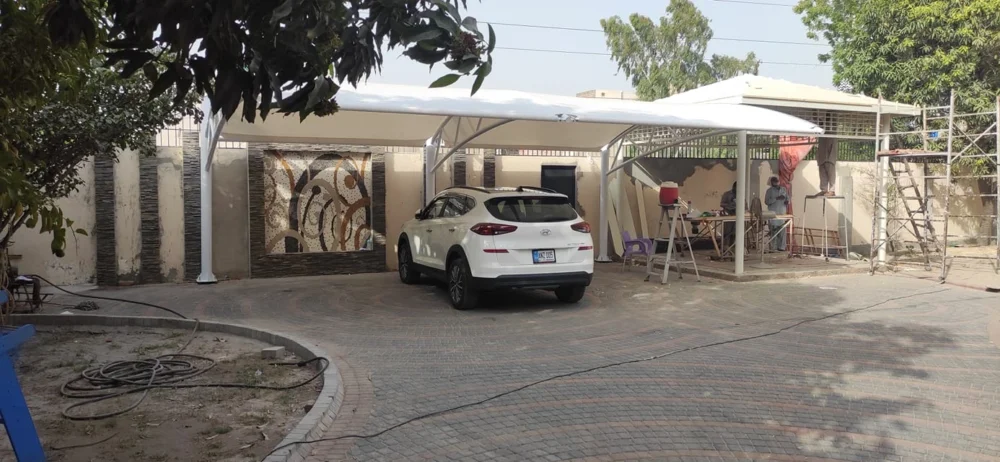 Stylish and durable designed car parking shade for home use, offering weather protection and modern aesthetics.