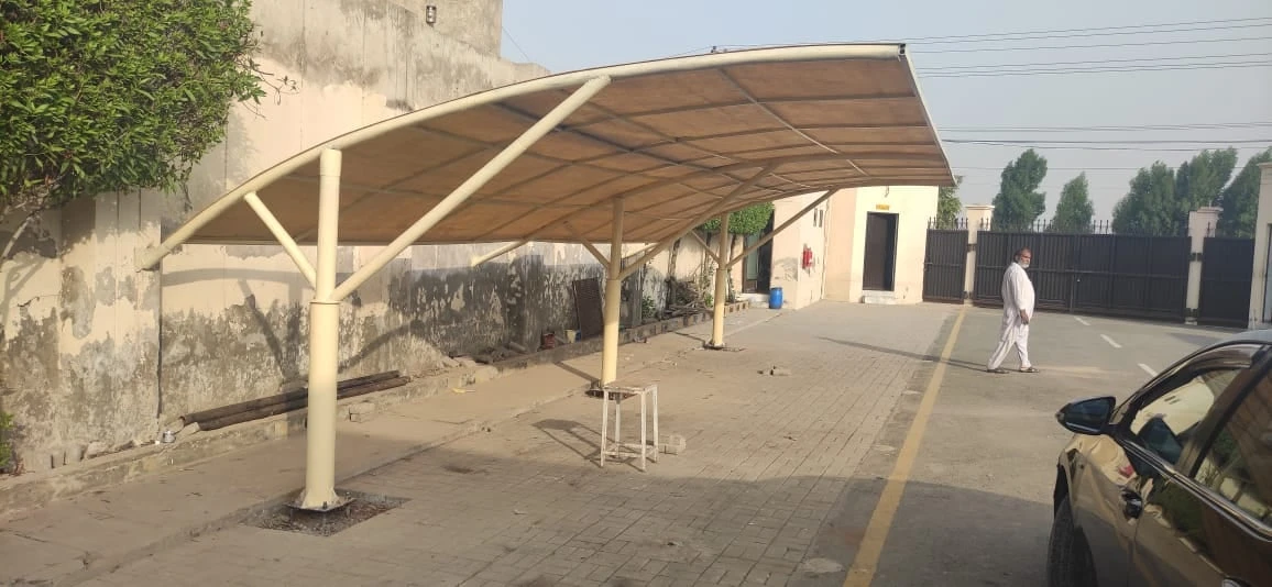 Fiber Car Parking Shades in Faisalabad (1) Fiber Car Parking Shades in Faisalabad by Covers and Shades – Durable and Weather-Resistant Solutions for Vehicle Protection