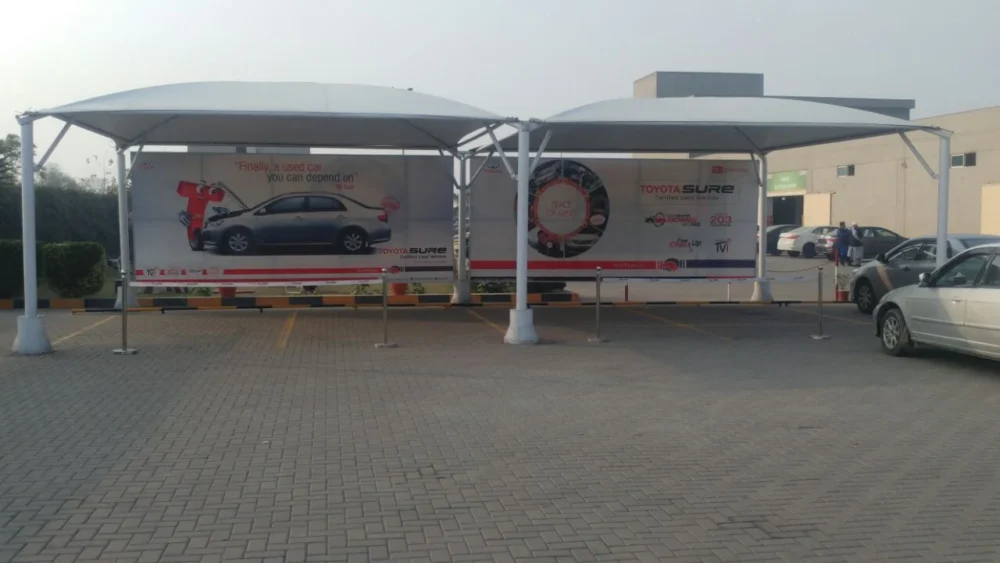 Parking shade canopy for homes and commercial spaces in Pakistan, offering durable and stylish protection for vehicles with customizable designs.