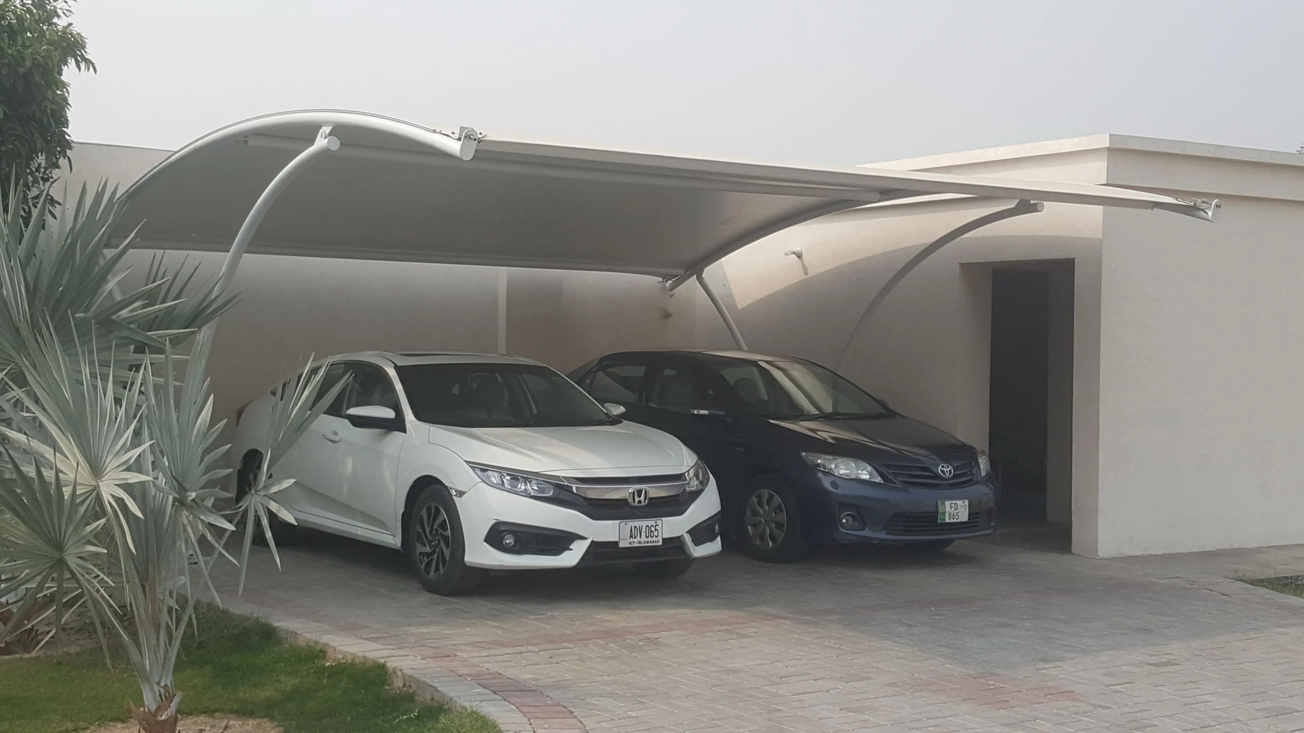 Premium Car Parking Shade for Home (2) Premium car parking shade for home offering durable, weather-resistant protection and stylish design for residential spaces.