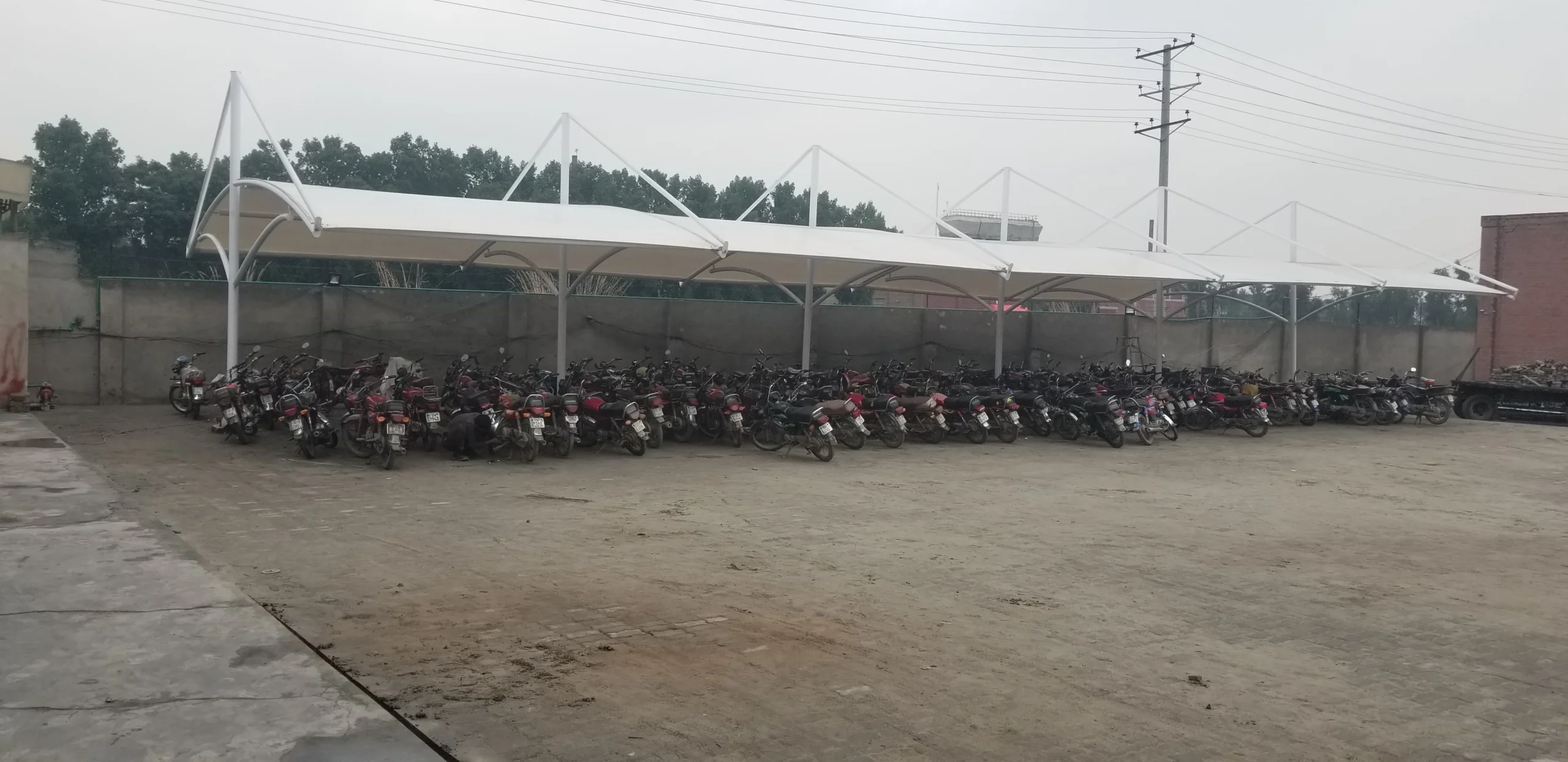 Affordable single pole car parking shade price in Pakistan - modern and durable parking shade solutions for your home or business.