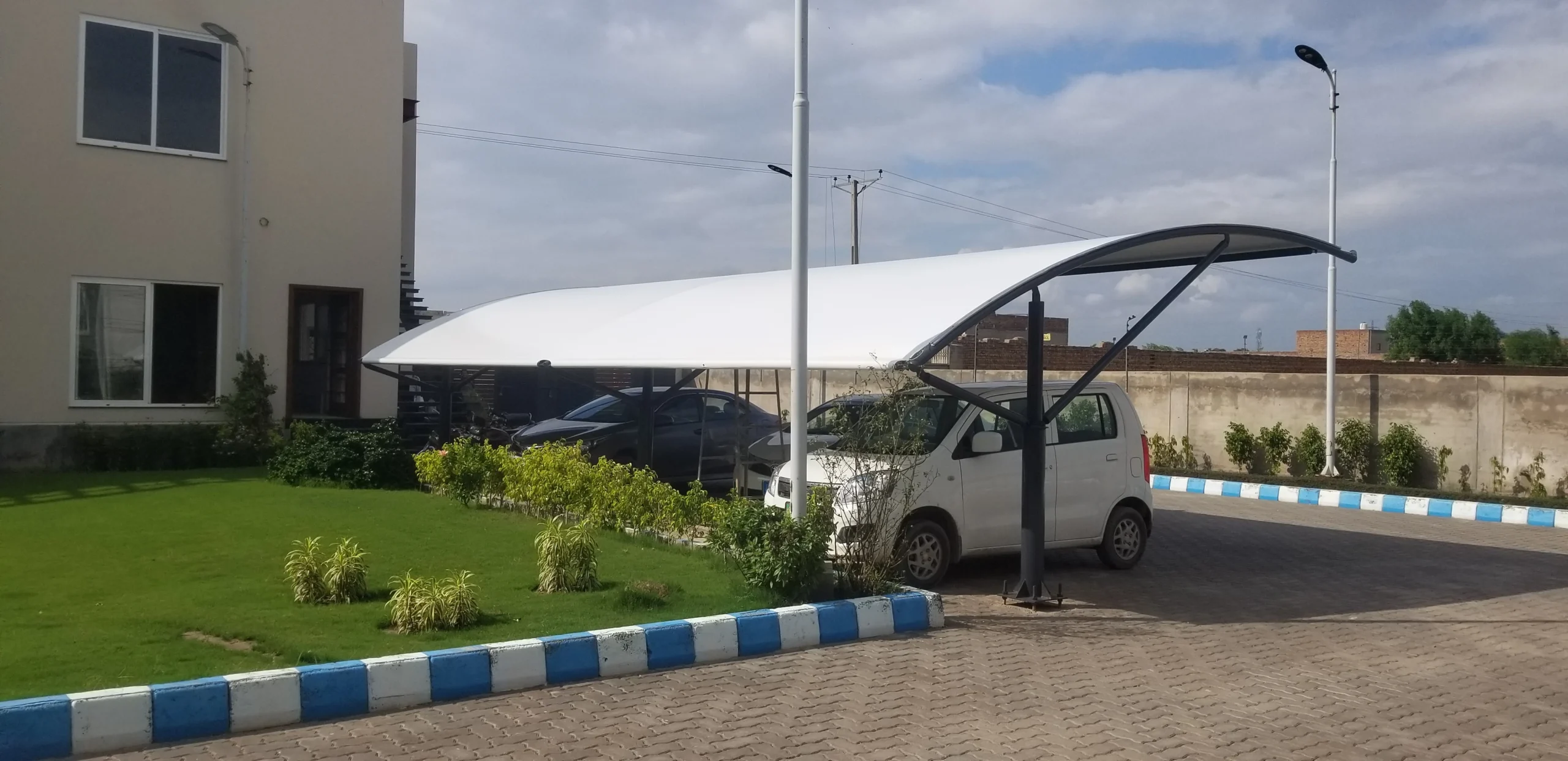 Find top car parking shades supplier in Pakistan offering durable, stylish, and weather-resistant solutions for residential and commercial spaces by Covers and Shades.