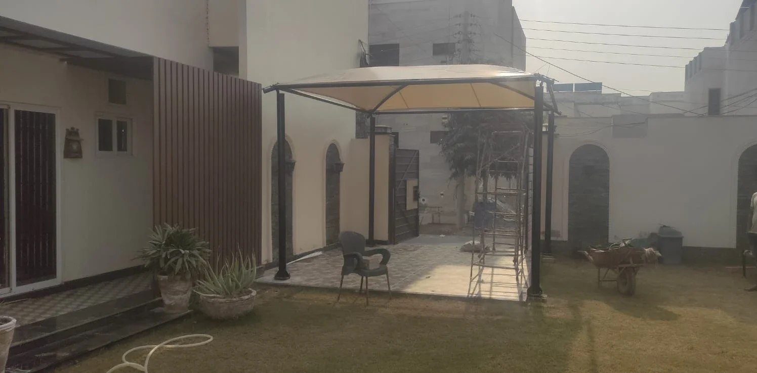 Modern gazebo with an elegant arch design, crafted for stylish and durable outdoor spaces, providing shade and aesthetic appeal