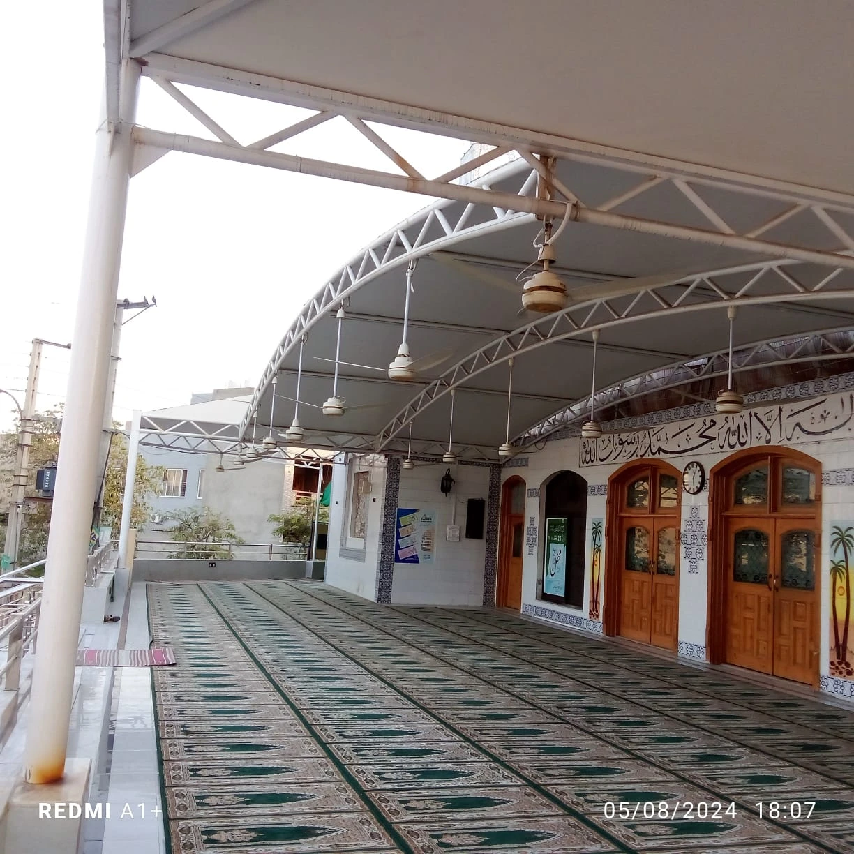 Mosque Shade - Tensile Fabric Shade in Pakistan offers waterproof sun protection with a center-pole-free design for unobstructed prayer spaces.