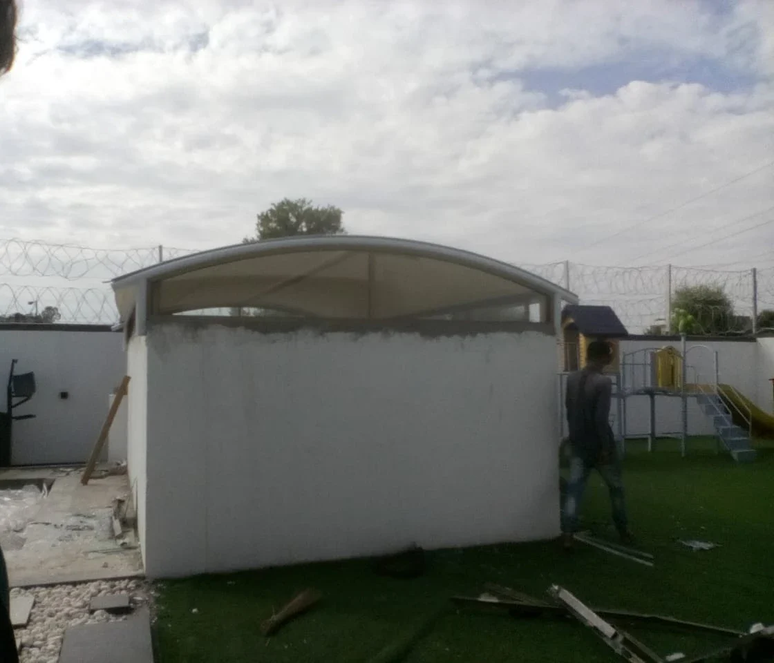 Skylight shade for canopy roof made with tensile fabric, designed for durability while allowing natural sunlight to filter through effortlessly.