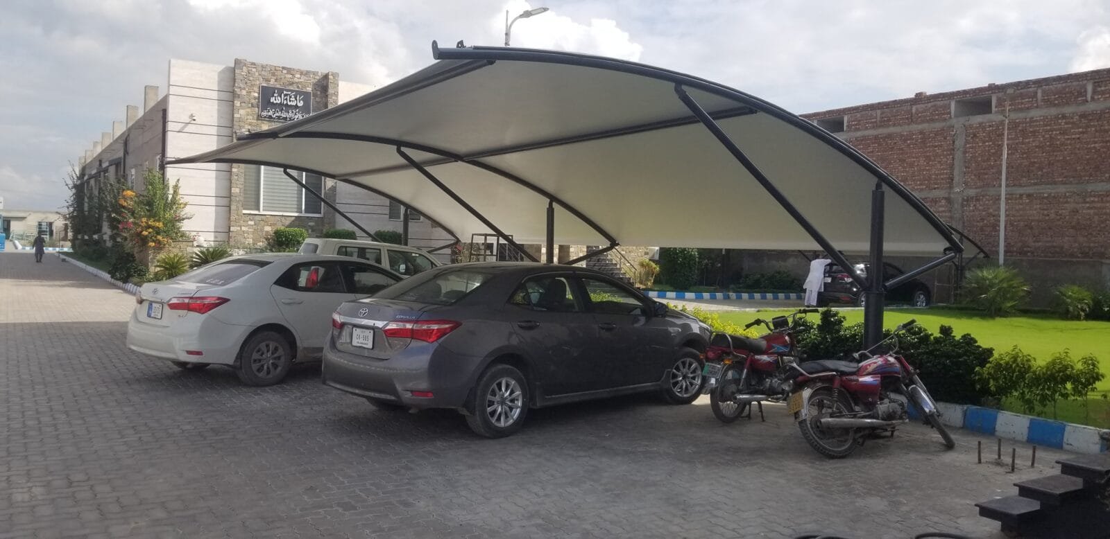 Car shed price in Pakistan with affordable and custom options from Covers and Shades, including tensile fabric and steel structures.