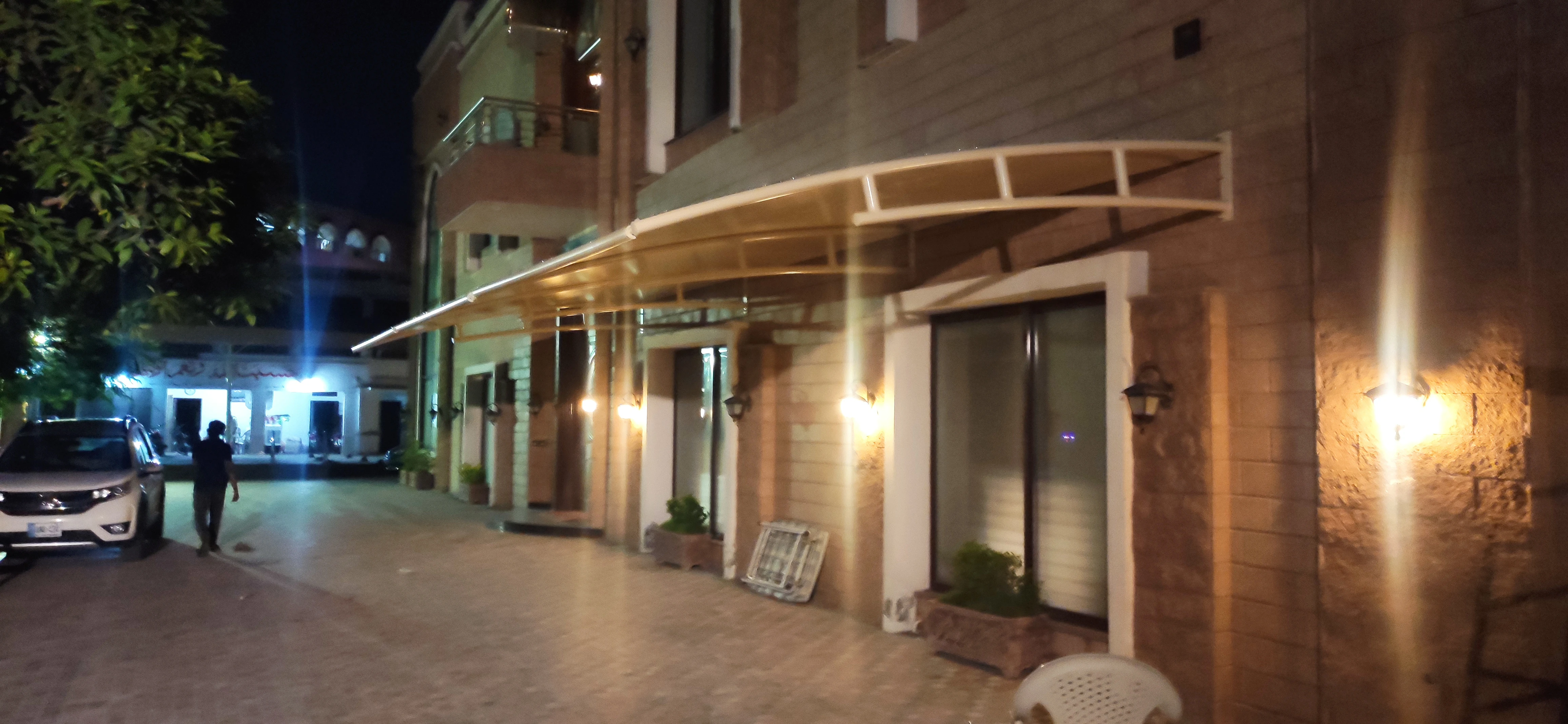 Modern shade design for home in Pakistan – Stylish and space-saving outdoor shading solutions for car parking, patios, and gardens.